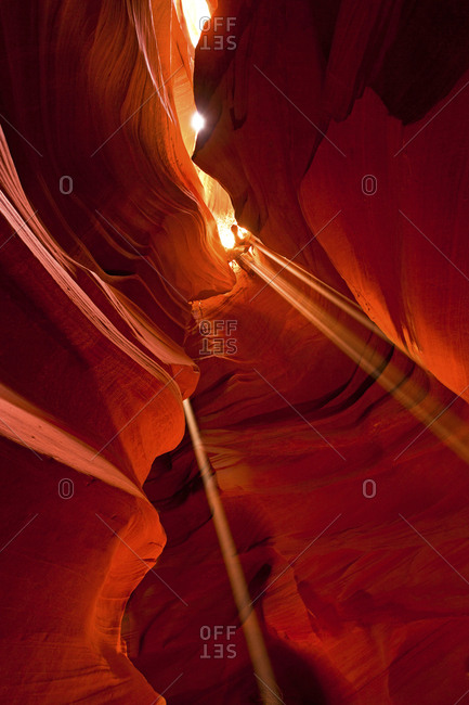 Light beams through the sandstone walls in Upper Antelope Canyon at the Navajo Nation, Coconino County