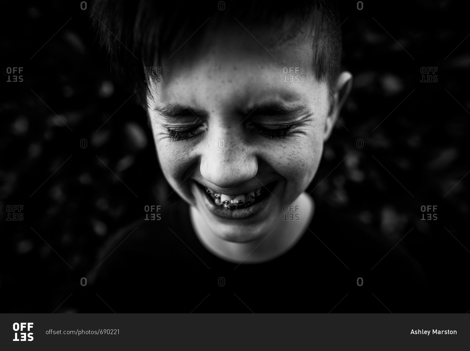 Close up of teenager with braces laughing