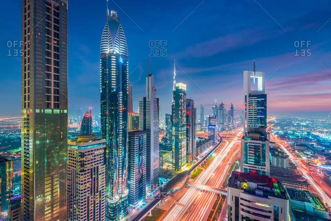 Dubai, United Arab Emirates - December 26, 2017: High Rises on Sheikh Zayed Road at twilight