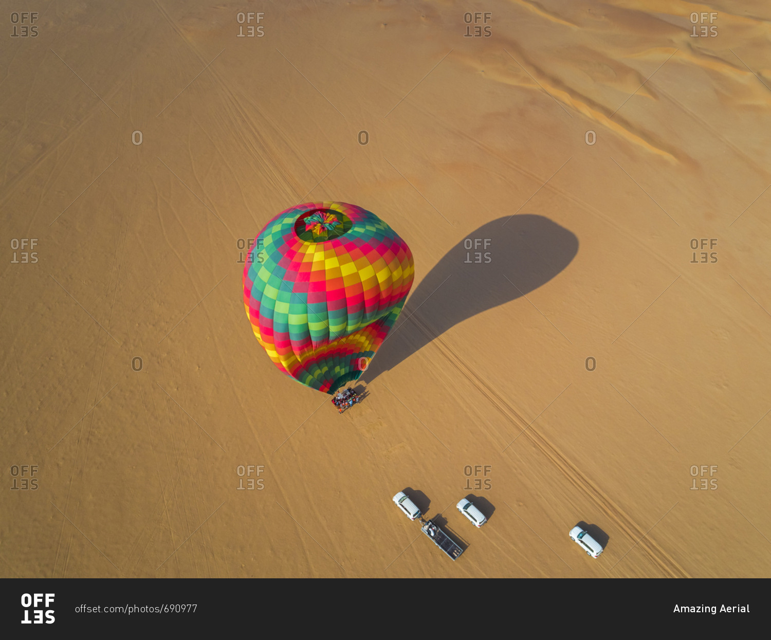 Aerial view of an hot-air-balloon landing in the Murqquab desert in Dubai, U.A.E.