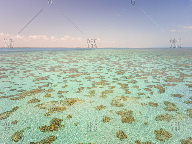 Aerial view of the transparent turquoise sea in Rio do Fogo, Brazil.