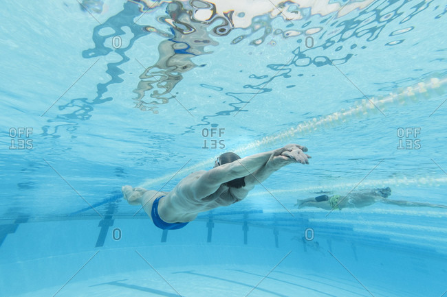 April 11, 2017: Underwater view of Olympic swimmer training in pool, Tenerife, Canary Islands, Spain