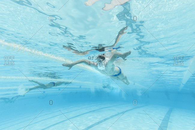 April 11, 2017: Underwater view of Olympic swimmer training in pool, Tenerife, Canary Islands, Spain