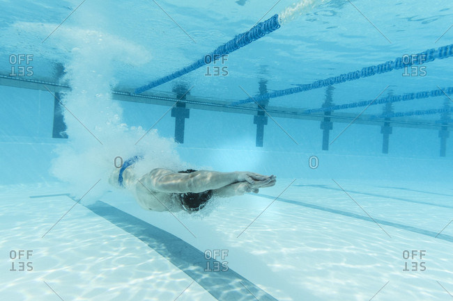 April 11, 2017: Underwater view of Olympic swimmer training in pool, Tenerife, Canary Islands, Spain