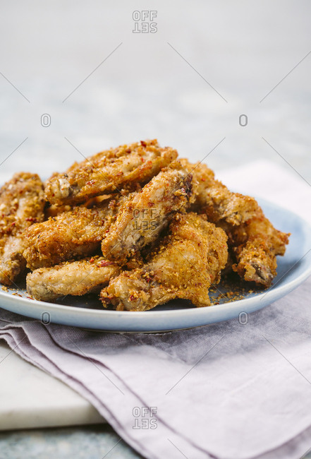 Crispy chicken wings on a plate
