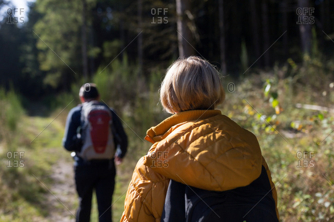 Older couple waling in the woods