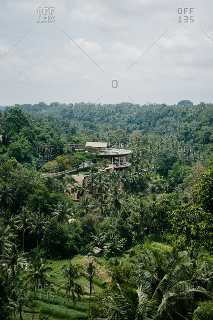 Bali, Indonesia - January 2, 2018: Resort surrounded by palm trees in Bali