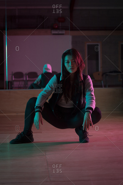 Young female dancer dancing in dance studio