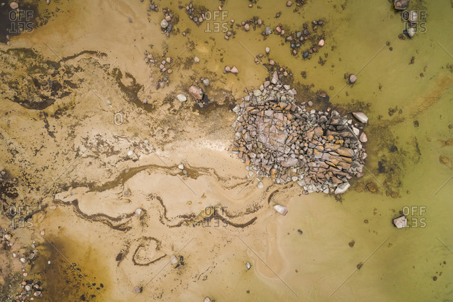Abstract aerial view of algae bloom on the beach at Muraste village, Estonia