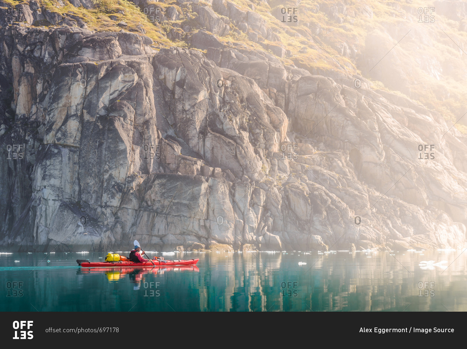 Man sea kayaking, Narsaq, Kitaa, Greenland