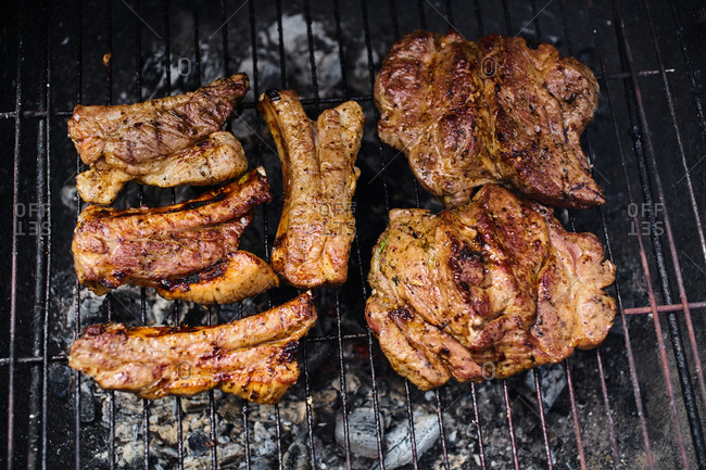 Overhead of perfectly grilled pork chops on hot grill