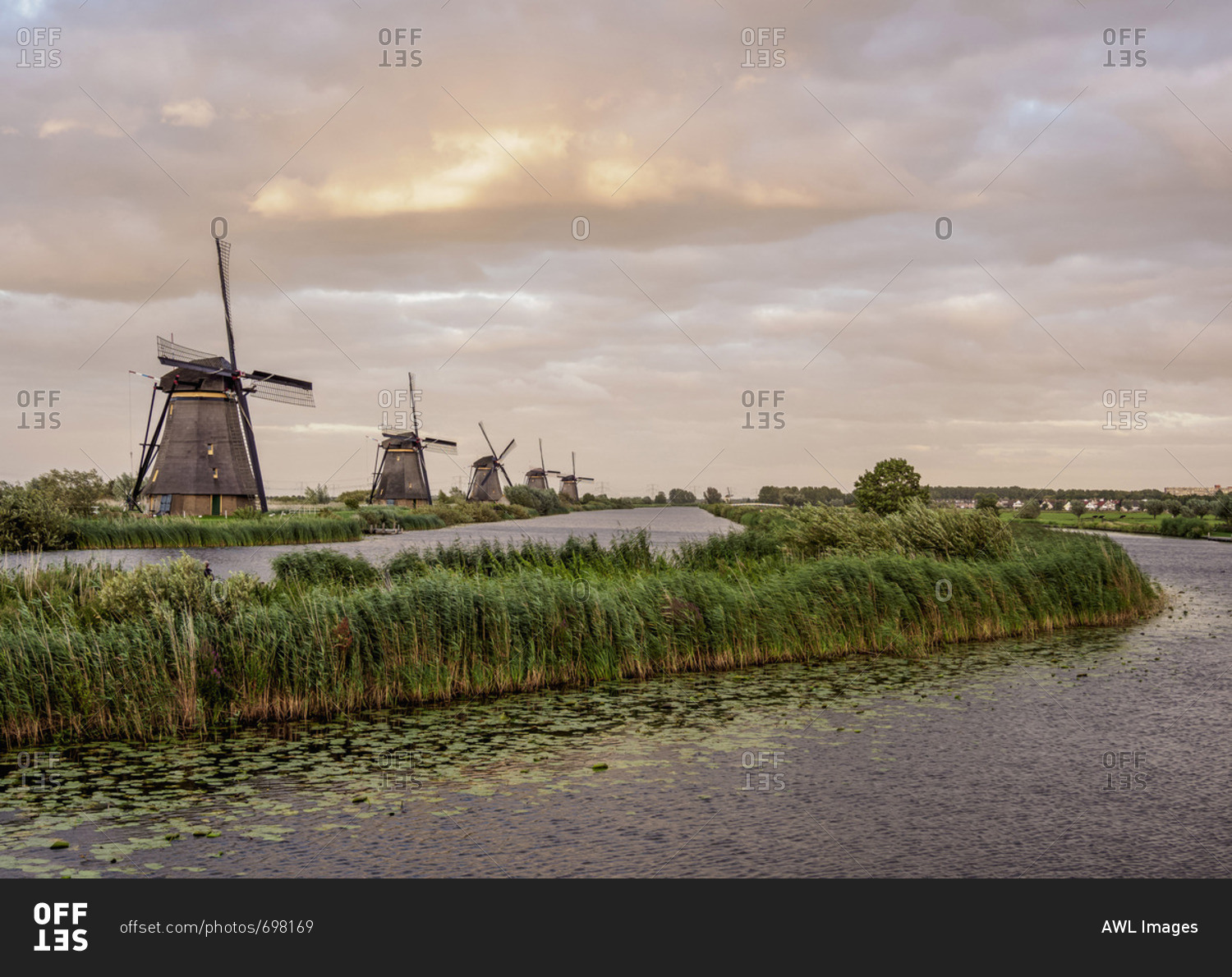 Windmills in Kinderdijk at sunset, UNESCO World Heritage Site, South Holland, The Netherlands