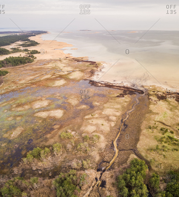 Aerial view of algae bloom in the sea on coastline of Vormsi island in Estonia