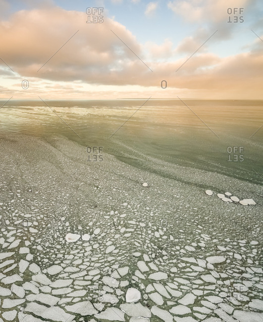 Aerial view of pieces of ice floating on the Baltic sea in Estonia.