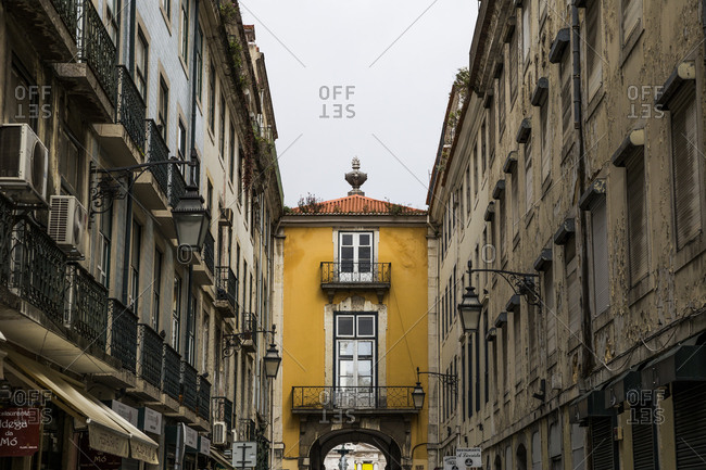 March 28, 2016: Yellow arch in the Baixa area of Lisbon, Portugal.