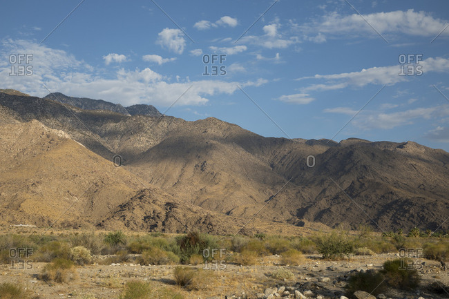 Arid hills rising out of the desert floor near Palm Springs, California