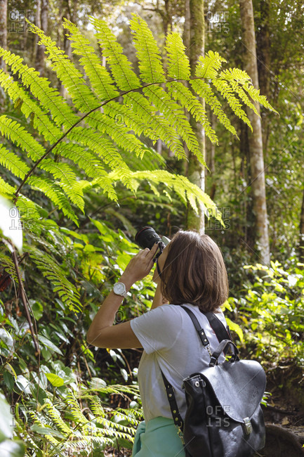 Young woman with camera
