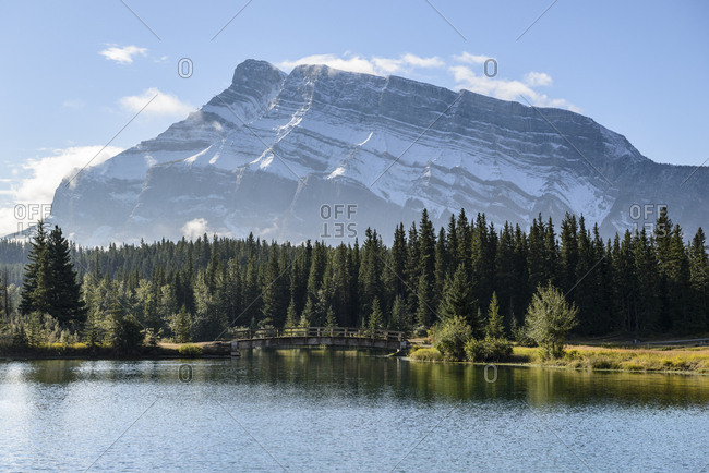 Canada, Alberta, Banff, Mountain peak reflecting in lake in Banff National Park