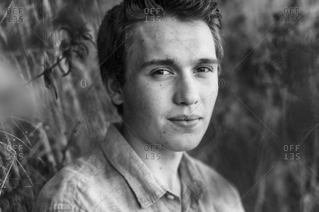 Outdoor Black And White Headshot Of Teenage Boy In Casual Button