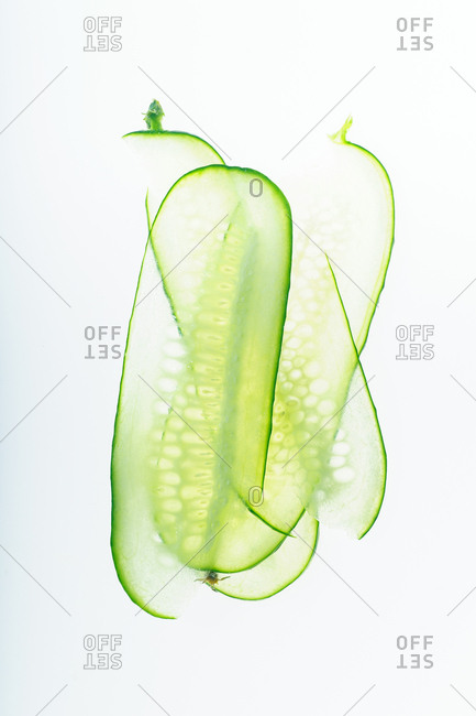 Minimalistic composition with thin cucumber slices