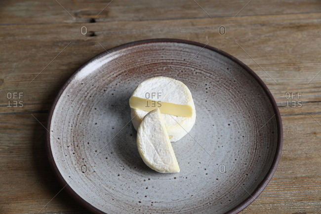 Overhead view of cheese on a round plate