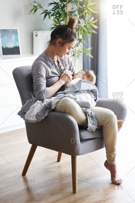 breastfeeding chair stock photos - OFFSET