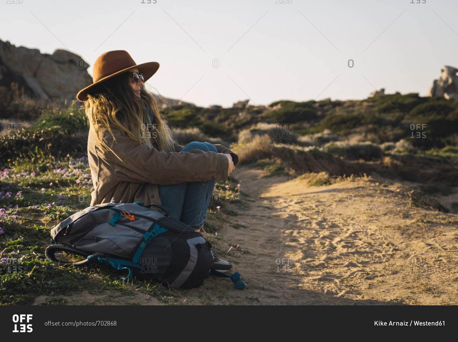 Italy- Sardinia- woman on a hiking trip having a break