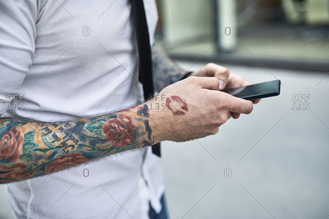 Hidden Tattoo on a Caucasian Businessman 911141 Stock Photo at Vecteezy