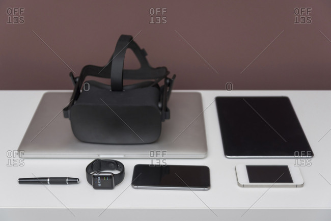 Wearables and mobile devices on dresser