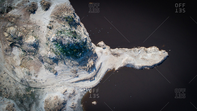 Aerial image over a very dry Theewaterskloof dam with massive patches of barren earth exposed, South Africa