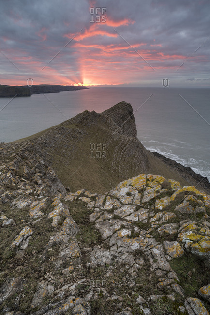 View towards Fall Bay and Mewslade Bay, at sunrise, Gower Peninsula, South Wales, United Kingdom, Europe