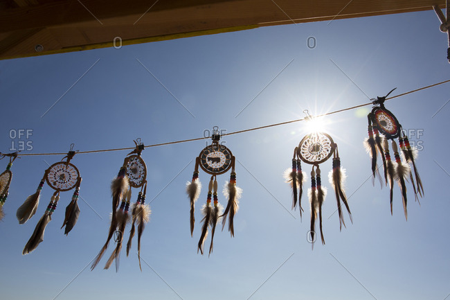 American Indian dreamcatchers for sale at roadside stand at sunrise in Arizona