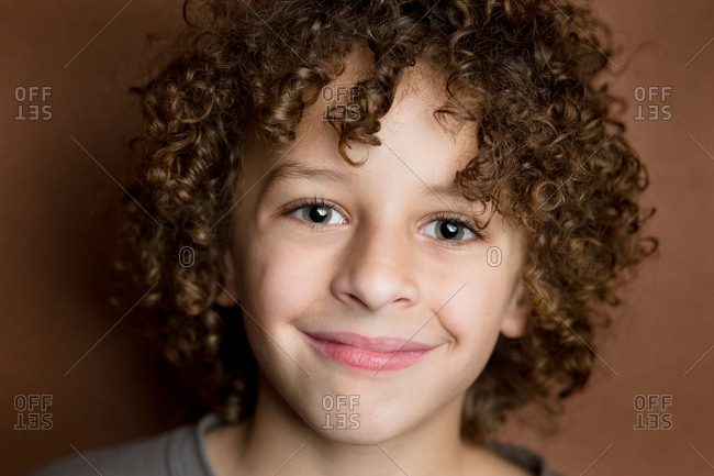 Close Up Of Young Mixed Race Boy Smiling Stock Photo Offset