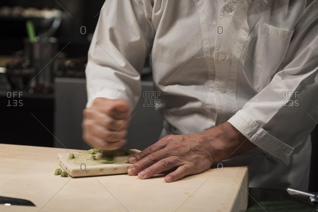 Japanese chef grinding wasabi