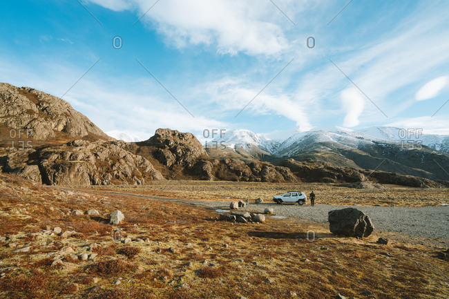 SUV parked in distance in scenic Vatnajokull National Park