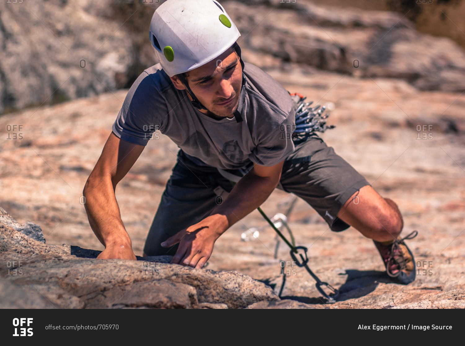 Young man, sport climbing, elevated view, Skaha Bluffs Provincial Park, Penticton, Canada