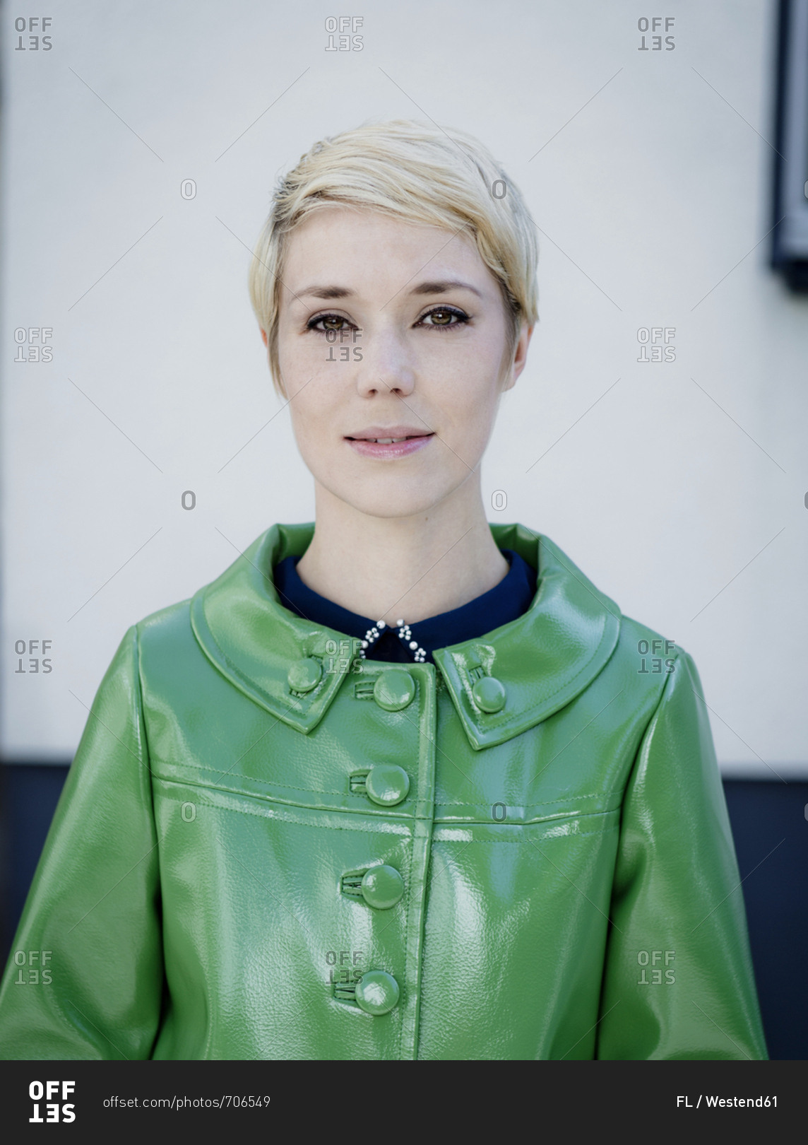 Portrait of woman wearing green vintage leather jacket
