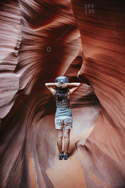 USA- Arizona- Woman with cowboy hat visiting Antelope Canyon