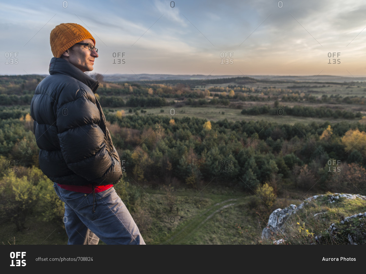 Man looking at view of forest, Polish Jura, Rzedkowice, Silesia, Poland