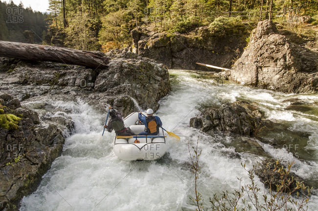 Two men rafting down Little North Santiam River, Opal Creek Wilderness, Oregon, USA