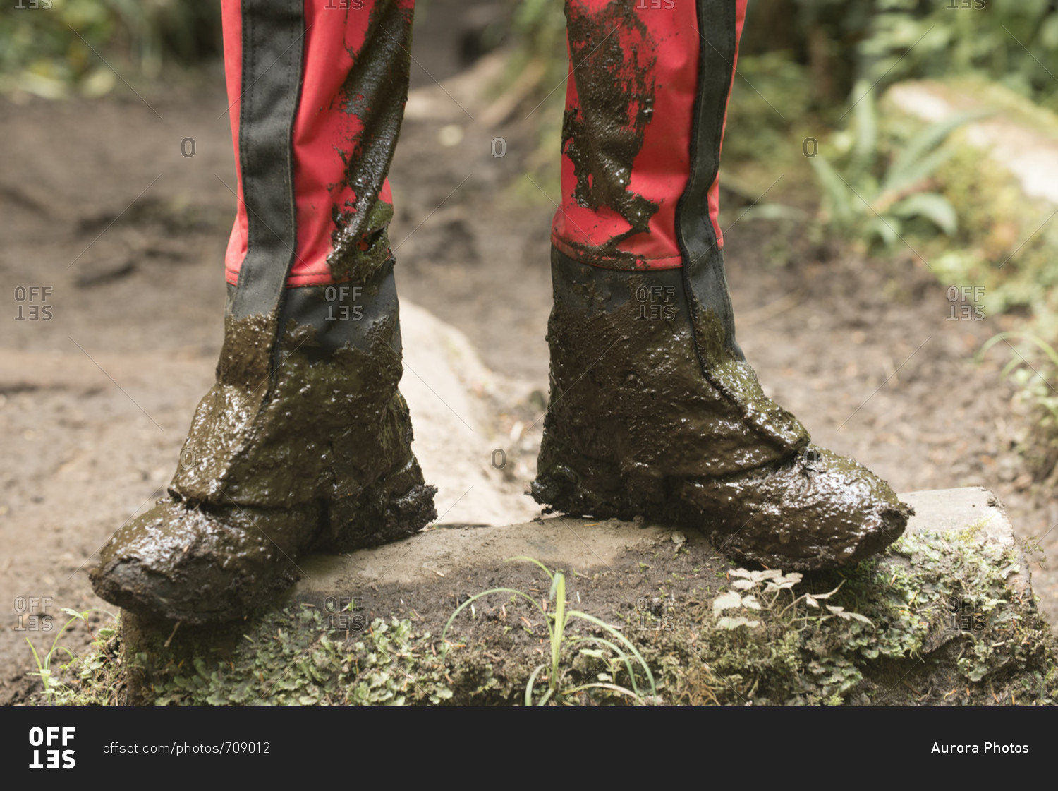 Muddy boots of backpacker, West Coast Trail, British Columbia, Canada