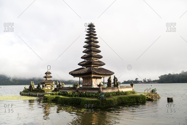 Hindu water temple appearing to float on Lake Bratan in Bali, Indonesia