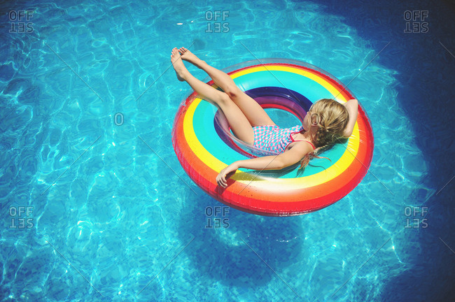 Pink Inflatable Donut Swimming Ring In A Swimming Pool Stock Photo -  Download Image Now - iStock