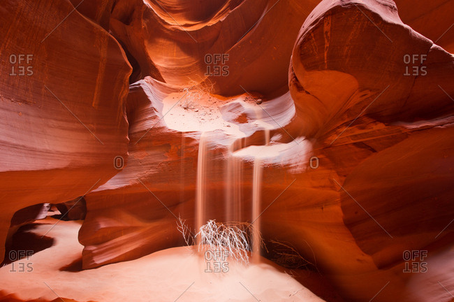 A sandfall in a slot canyon