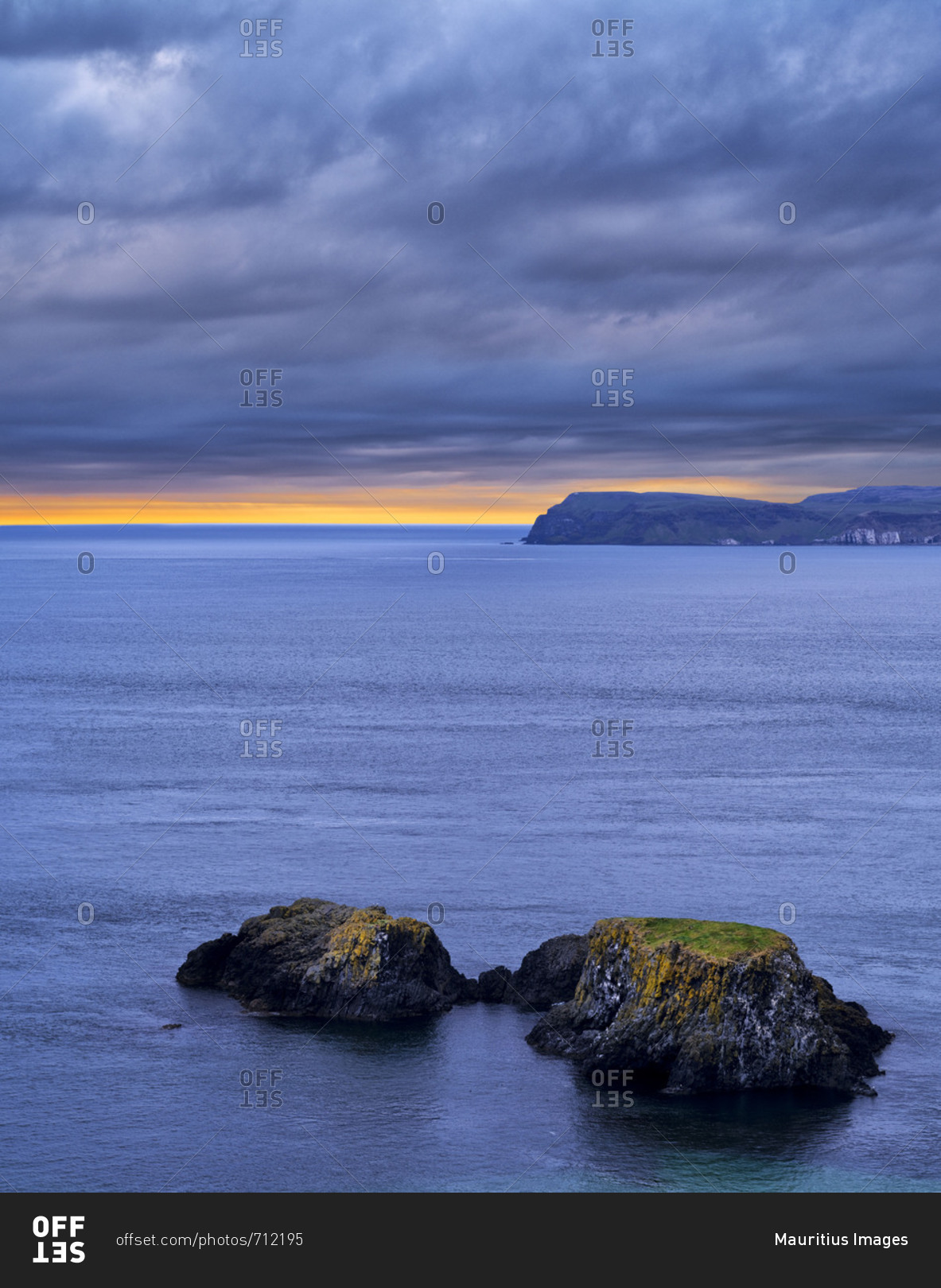 Northern Ireland, Antrim, Causeway Coast, rocky islands in the Causeway Coast, evening sky