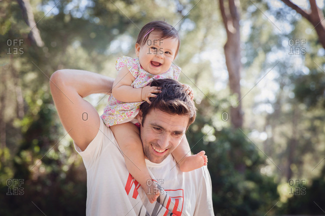 carrying toddler on shoulders