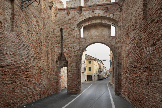 June 6, 2012: Italy, Veneto, Cittadella . Cittadella is a medieval walled city in the province of Padua, founded in the 13th century as a military outpost of Padua. The surrounding wall has been restored and is 1,461 metres in circumference with a diameter of around 450 metres. View of the City Walls with Porta Vicenza (or Porta Vicentina), one of the four gates of the city