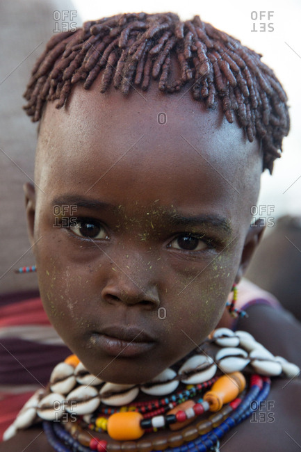 Ethiopia - November, 25, 2014: Close-up view of lovely black toddler smiling and looking at camera