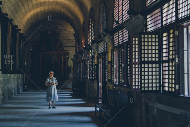 PHILIPPINES, APRIL 16, 2018: cheerful nun in blue gowns