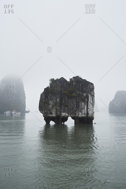Ha Long Bay minimal landscape in cloudy and foggy day